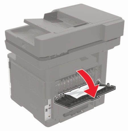 Paper jam in the rear door | Lexmark MX522