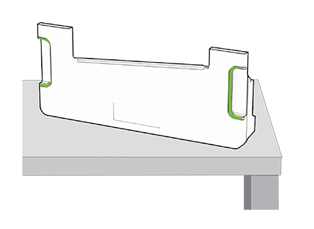 Proper position of the waste toner bottle upon removal from the printer.